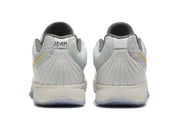Nike Kyrie Low Basketball Shoes in Gray and Gold