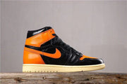 Air Jordan 1 Retro High OG Black and Orange Sneakers