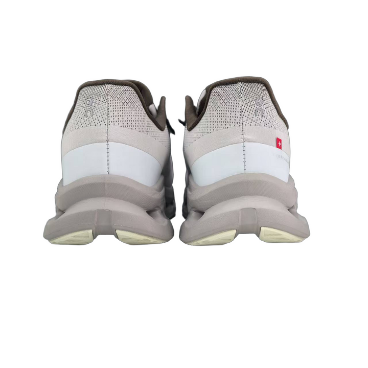 On Cloudmonster Running Shoes in Light Gray and Taupe