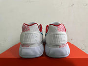 Nike White and Pink Low-Top Sneakers with Blue Swoosh