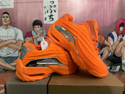 Orange Low-Top Sneakers with Metallic Side Panels